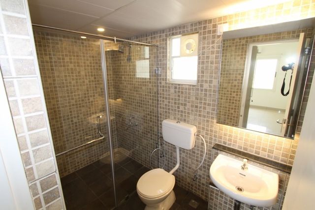 Bathroom with glass shower enclosure
