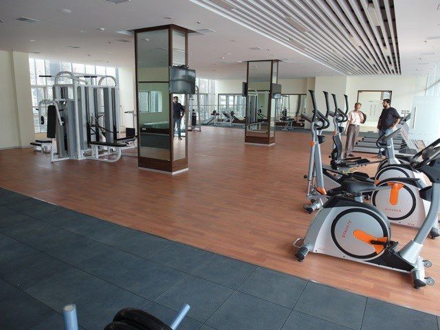 Gymnasium with exercise bikes and weight machines